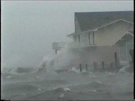 Surge encroaches coastal  home